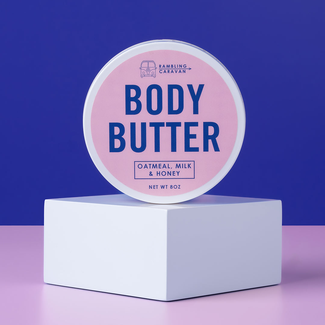 Group flat lay of colorful body butter collection by Rambling Caravan.