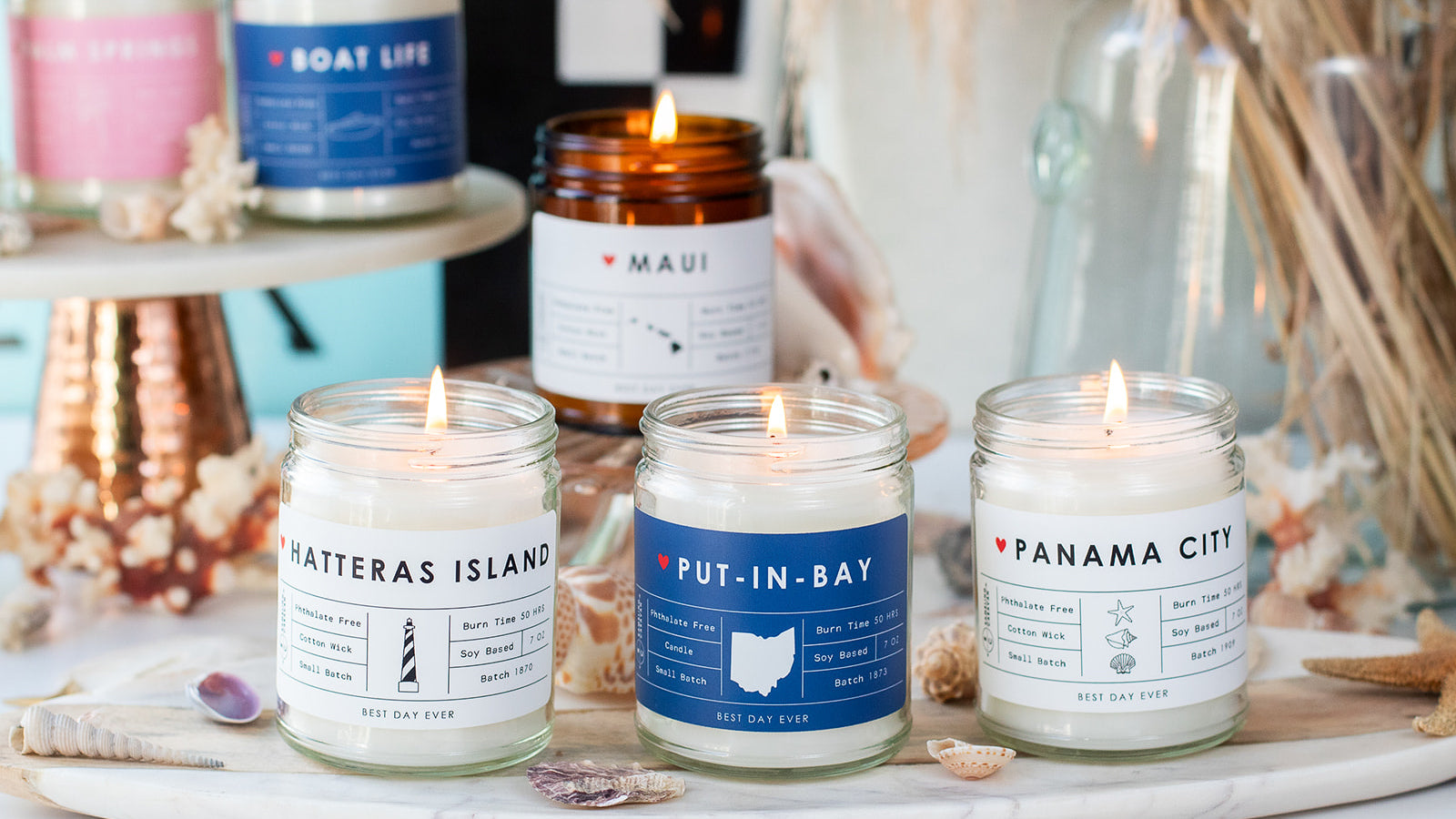 Group of island-inspired soy-based candles made by Rambling Caravan.